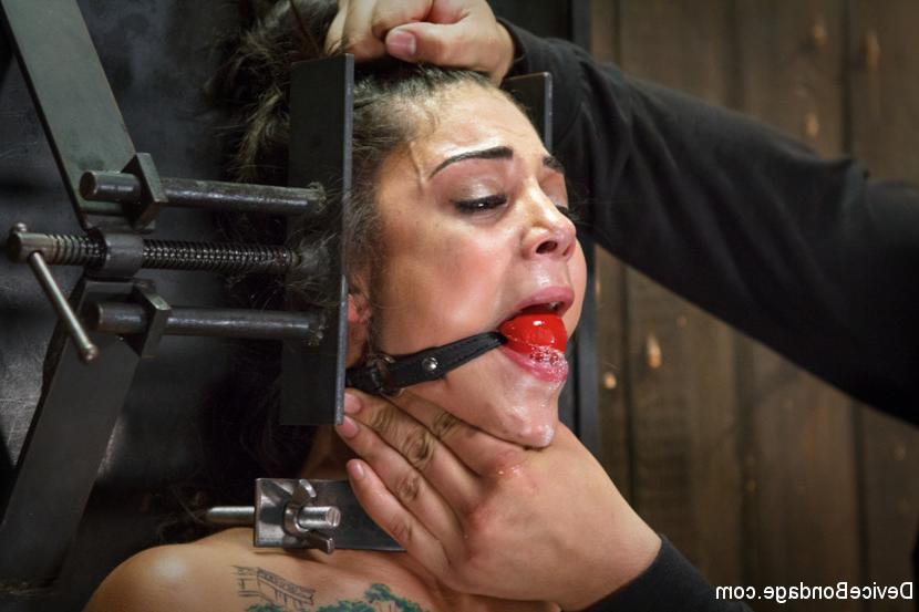 15P Tattooed brunette squirts while being tortured in bondage