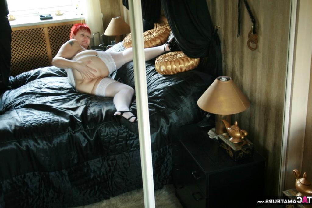 20P Mature redhead Valgasmic Exposed displays her hits & twat in front of a mirror