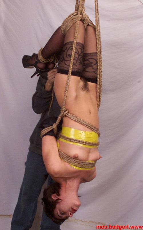 20P Short-haired in nylon stockings American Viva gets bound by her master
