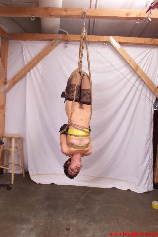 20P Short-haired in nylon stockings American Viva gets bound by her master