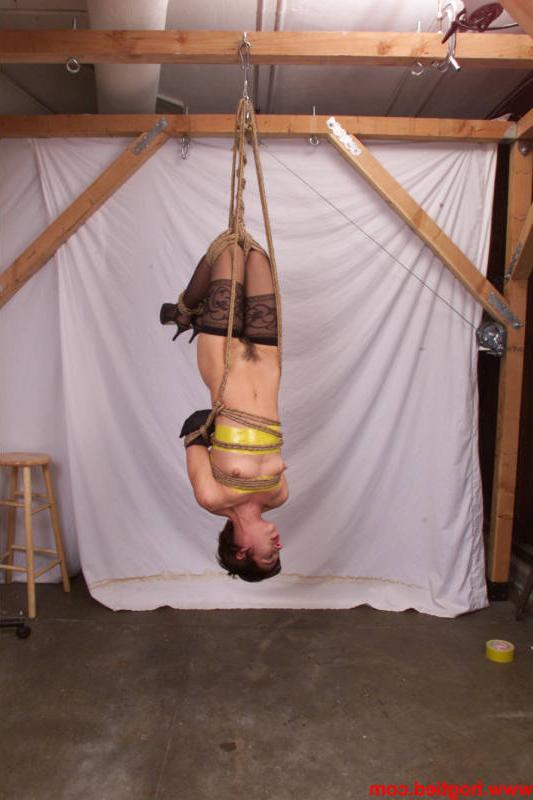 20P Short-haired in nylon stockings American Viva gets bound by her master