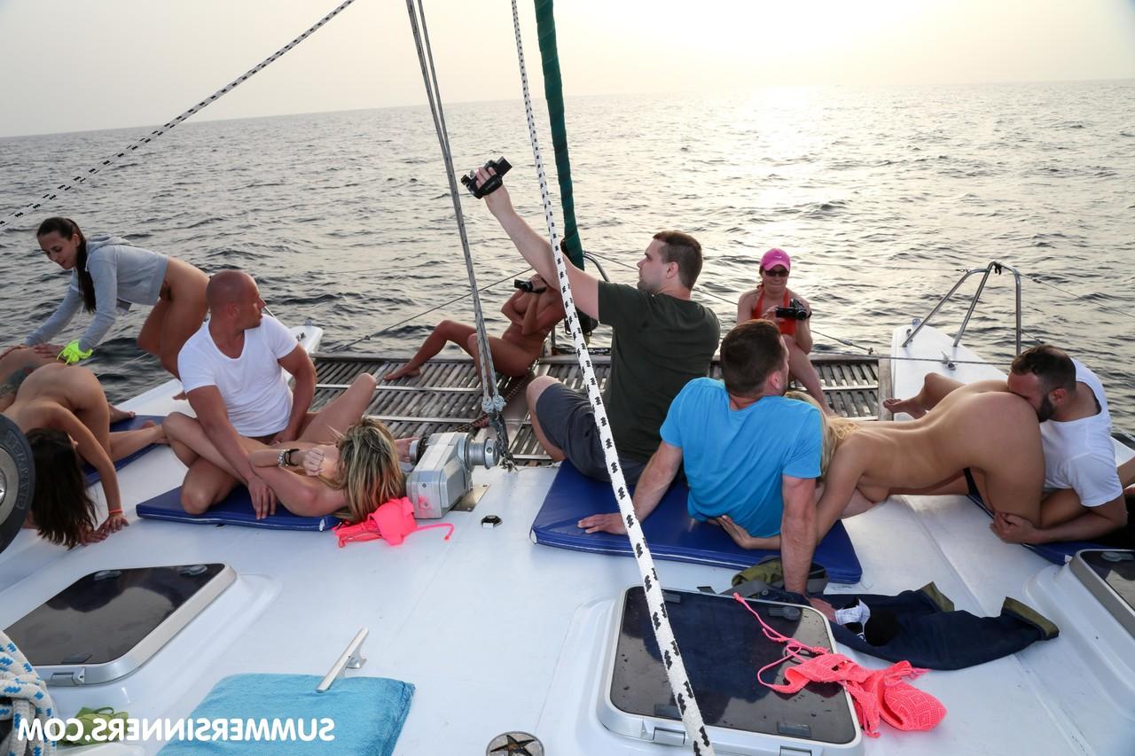 20P Slutty babes fuck multiple men and have lesbian sex outdoors on a boat