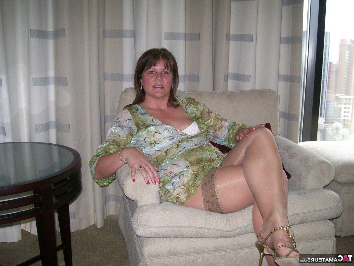 16P Mature lady Cassandra Uk slides her panties aside after showing her nipples