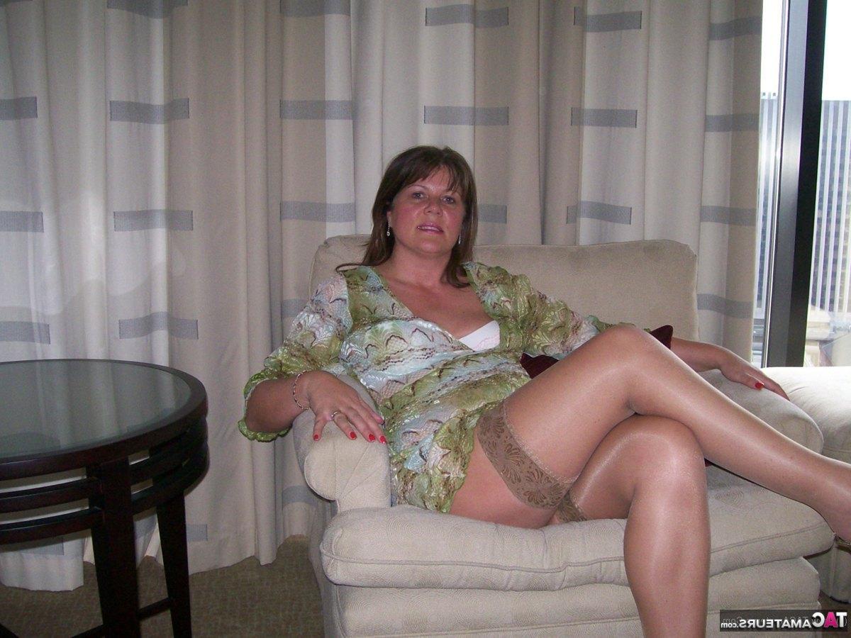 16P Mature lady Cassandra Uk slides her panties aside after showing her nipples