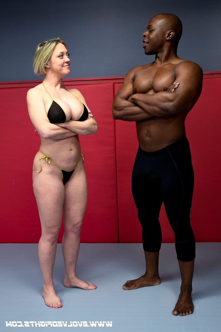 20P Sexy MILF Dee Williams strips and wrestles with a black guy before sex