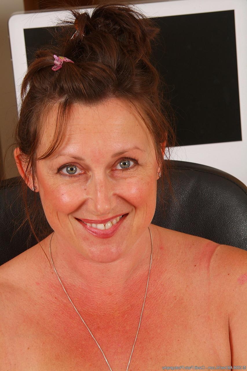 20P Chubby secretary Marishka strips and spreads her furry pussy at the office