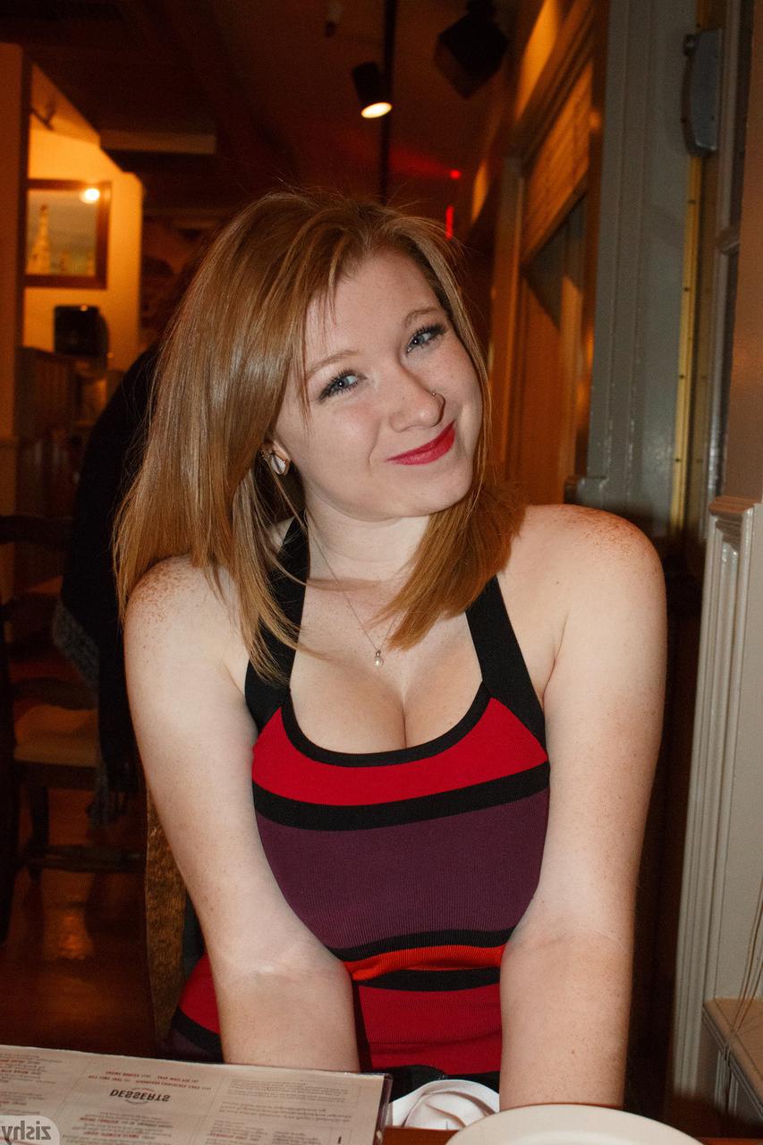 12P Adorable ginger babe Irelynn Dunham exposes her big tits and big ass on a bed