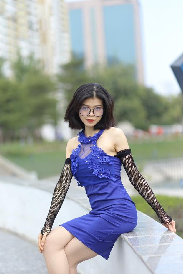20P Glamorous Asian babe Irena posing in her elegant blue dress outside