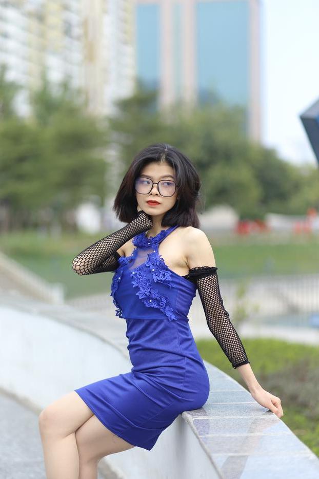 20P Glamorous Asian babe Irena posing in her elegant blue dress outside