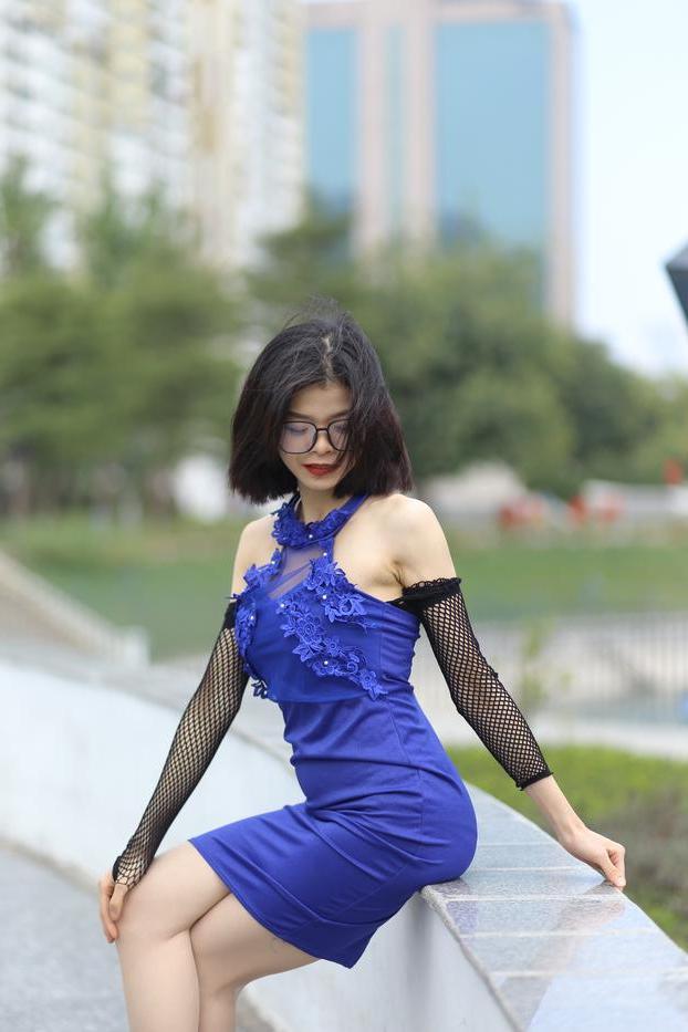 20P Glamorous Asian babe Irena posing in her elegant blue dress outside