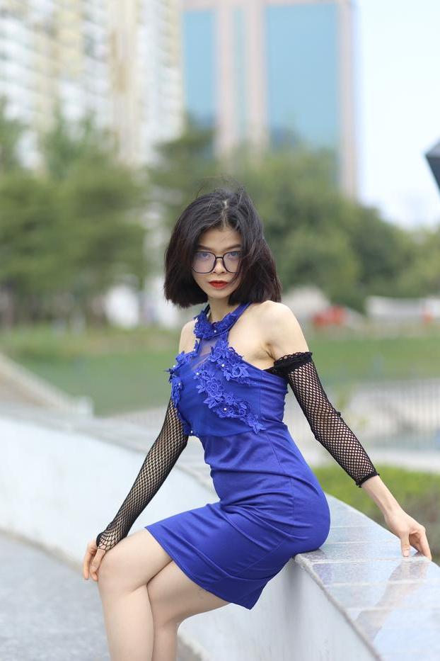 20P Glamorous Asian babe Irena posing in her elegant blue dress outside