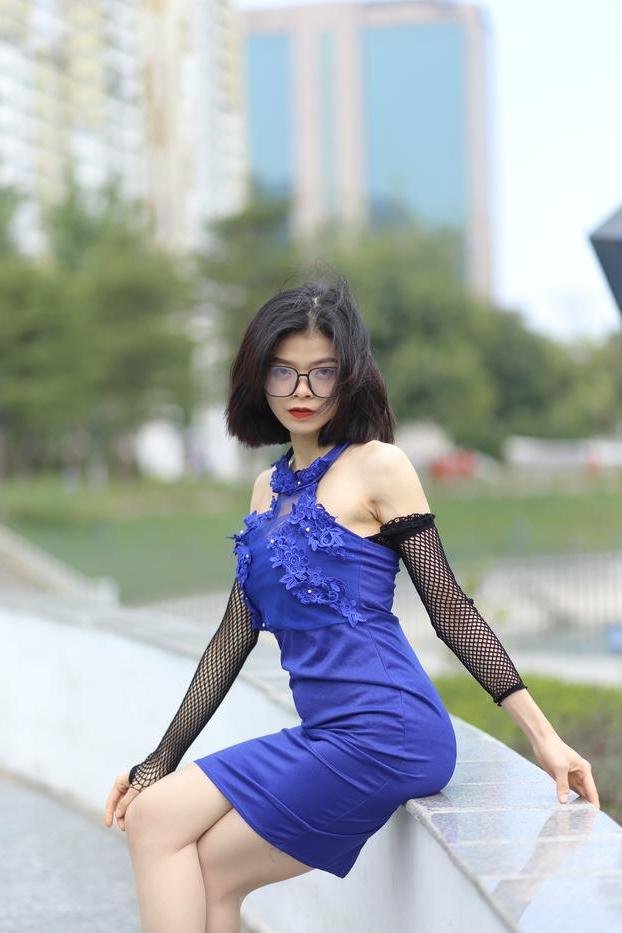 20P Glamorous Asian babe Irena posing in her elegant blue dress outside
