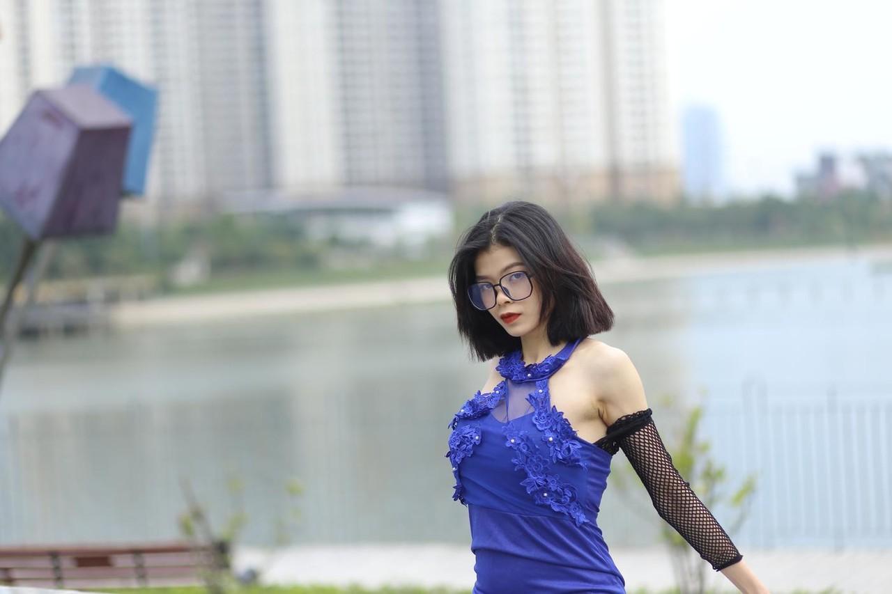 20P Glamorous Asian babe Irena posing in her elegant blue dress outside