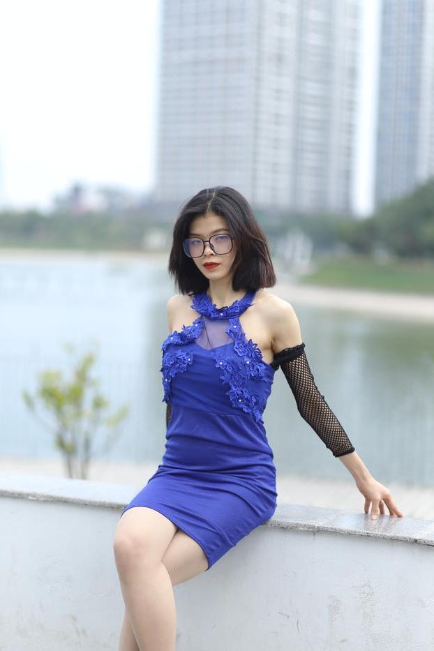 20P Glamorous Asian babe Irena posing in her elegant blue dress outside
