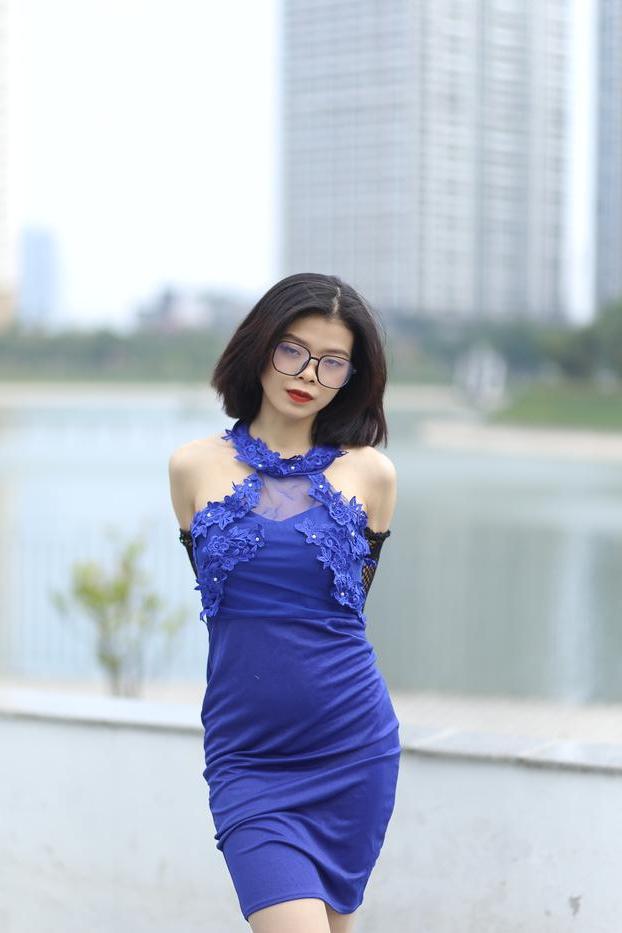20P Glamorous Asian babe Irena posing in her elegant blue dress outside
