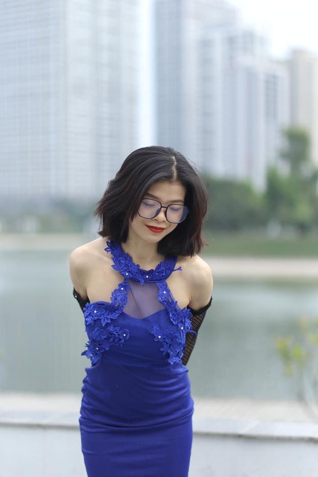 20P Glamorous Asian babe Irena posing in her elegant blue dress outside