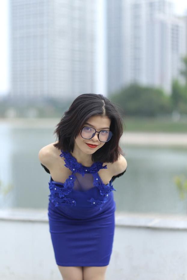 20P Glamorous Asian babe Irena posing in her elegant blue dress outside