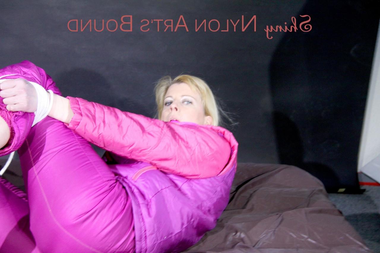 16P Blonde girl is left on a mattress in nylon attire while gagged and restrained