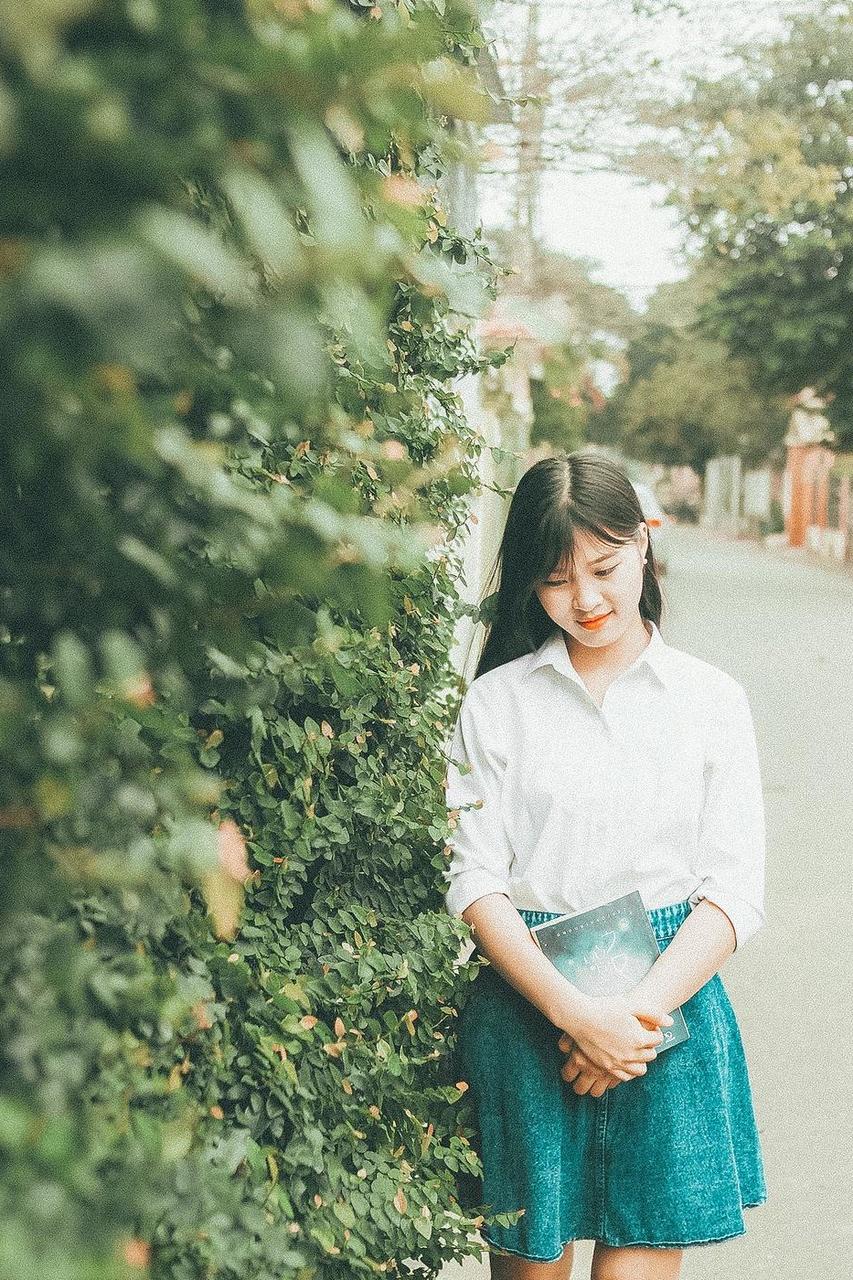 20P Cute Asian babe Luilull posing in her white shirt and skirt in a solo