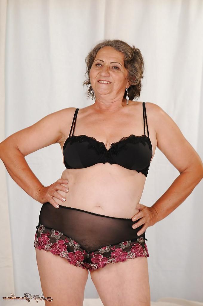 16P Naughty granny with fatty curves getting rid of her lingerie