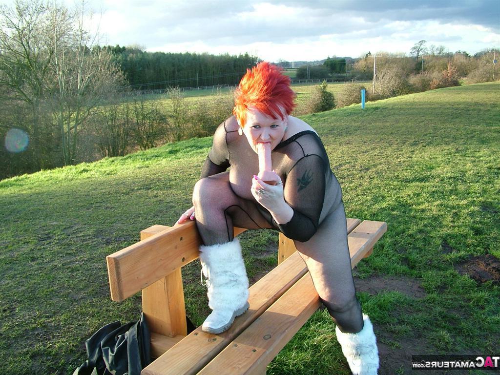 20P Redhead Valgasmic Exposed plays with a toy in a park in a crotchless stocking