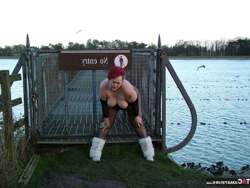 20P Redhead Valgasmic Exposed plays with a toy in a park in a crotchless stocking