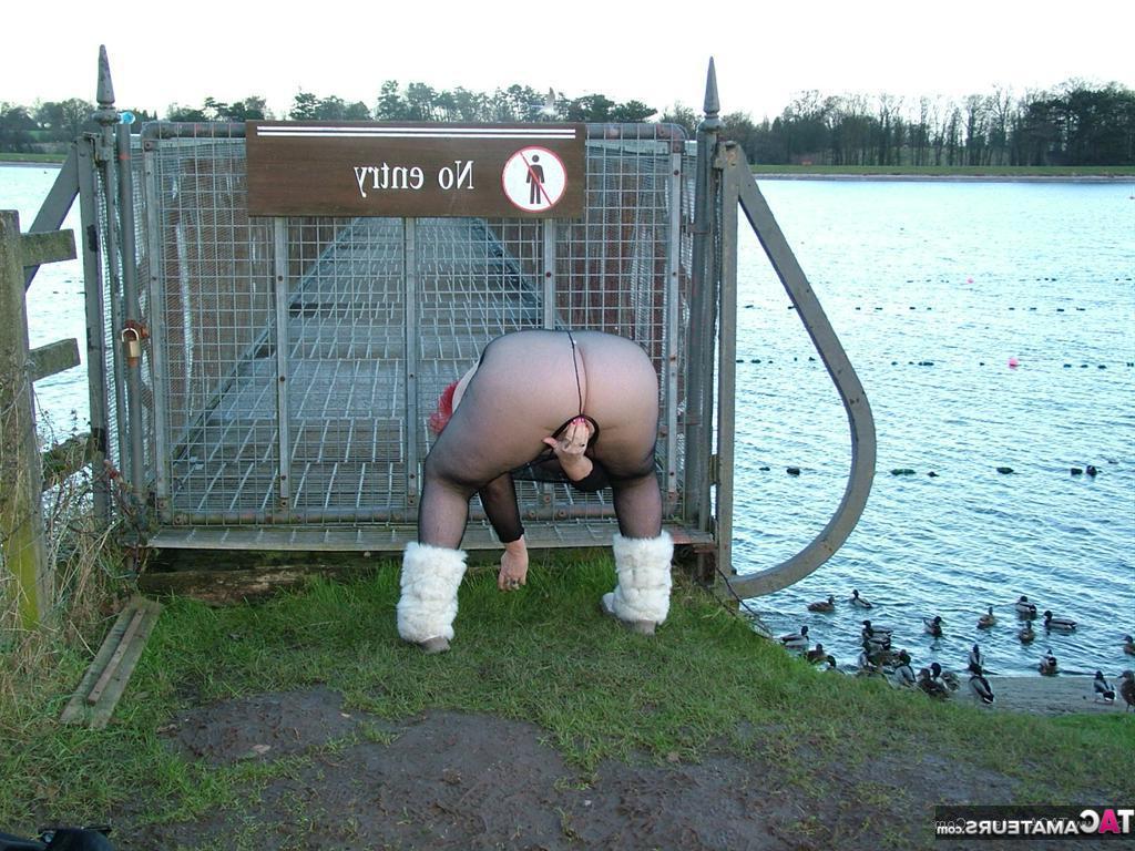 20P Redhead Valgasmic Exposed plays with a toy in a park in a crotchless stocking
