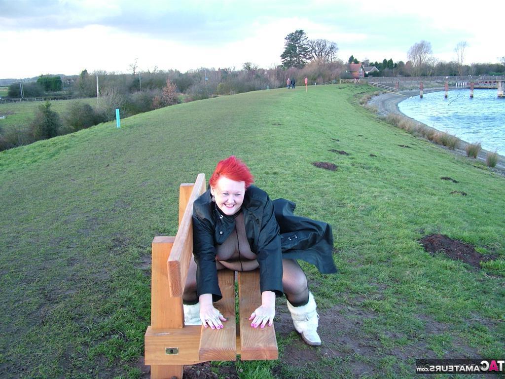 20P Redhead Valgasmic Exposed plays with a toy in a park in a crotchless stocking