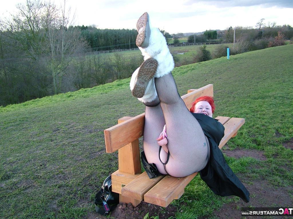 20P Redhead Valgasmic Exposed plays with a toy in a park in a crotchless stocking