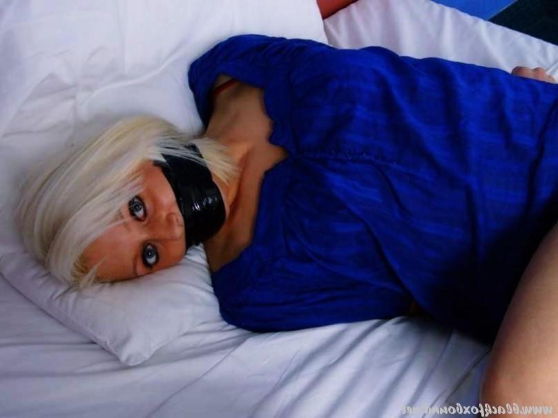 16P Platinum blonde is silenced and restrained with duct tape on her bed