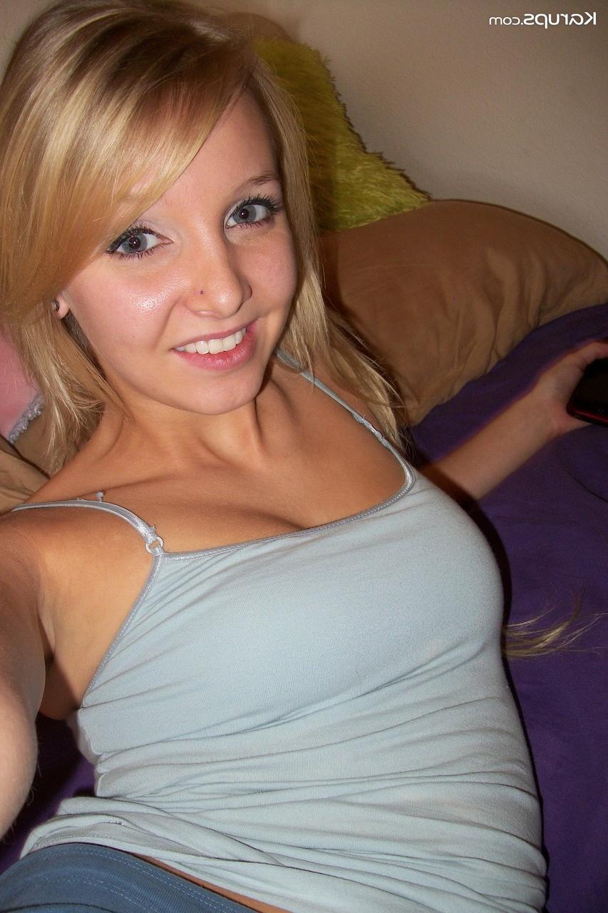 20P Naturally busty Elle strips in her bedroom and reveals her yummy pink holes