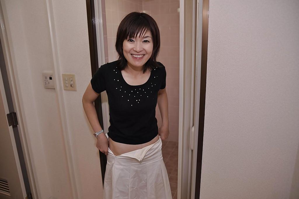 16P Sassy asian MILF with tiny tits Miki Ando undressing and taking shower