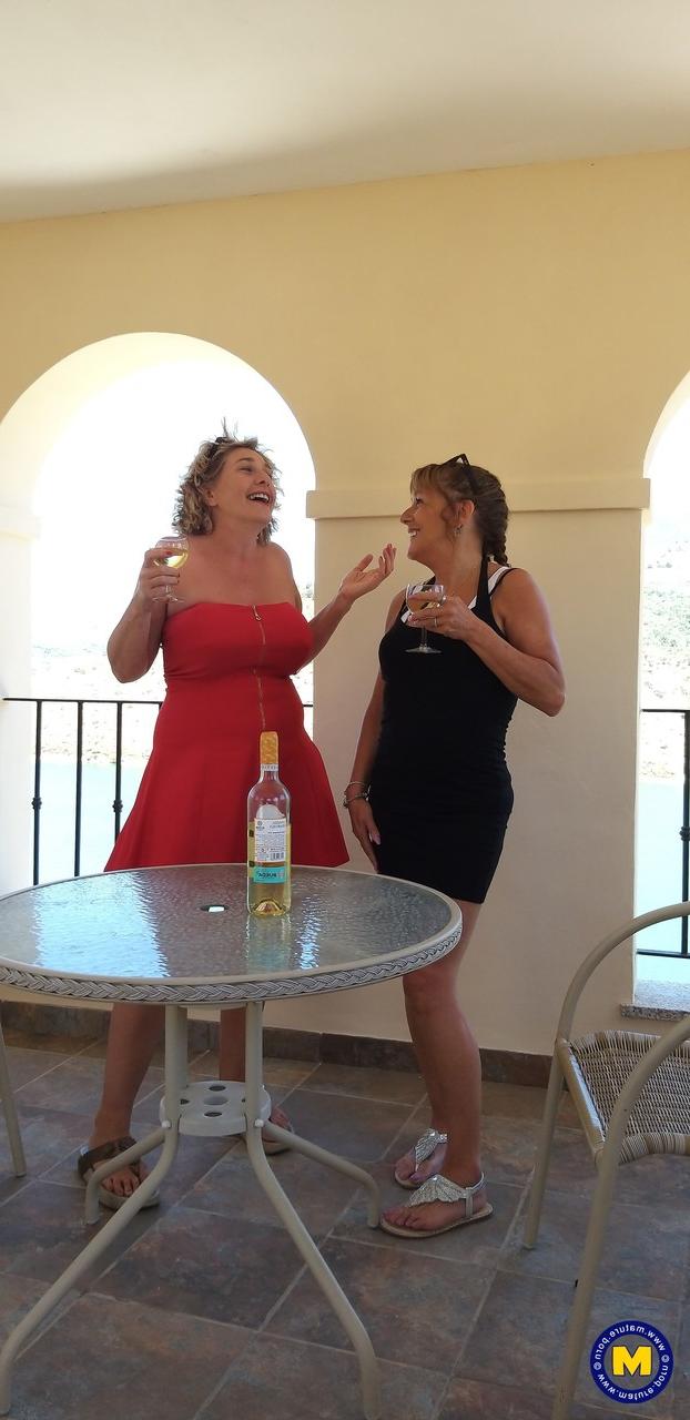 20P Curvaceous mature lesbians Camilla C & Pandora drinking wine on vacation