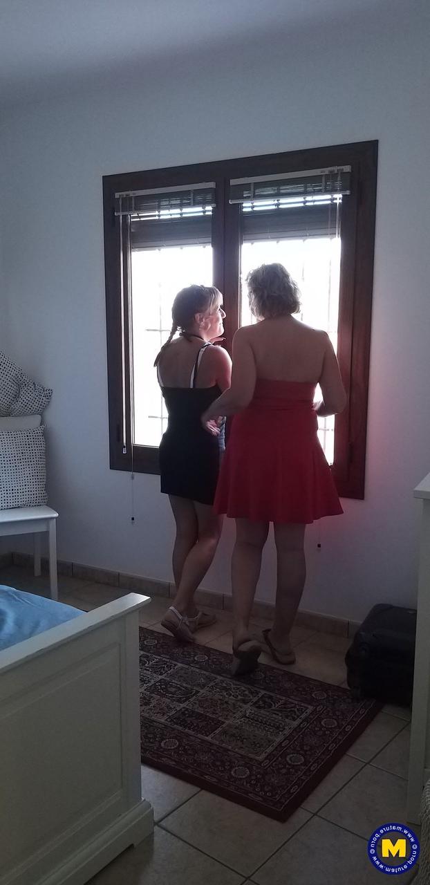 20P Curvaceous mature lesbians Camilla C & Pandora drinking wine on vacation