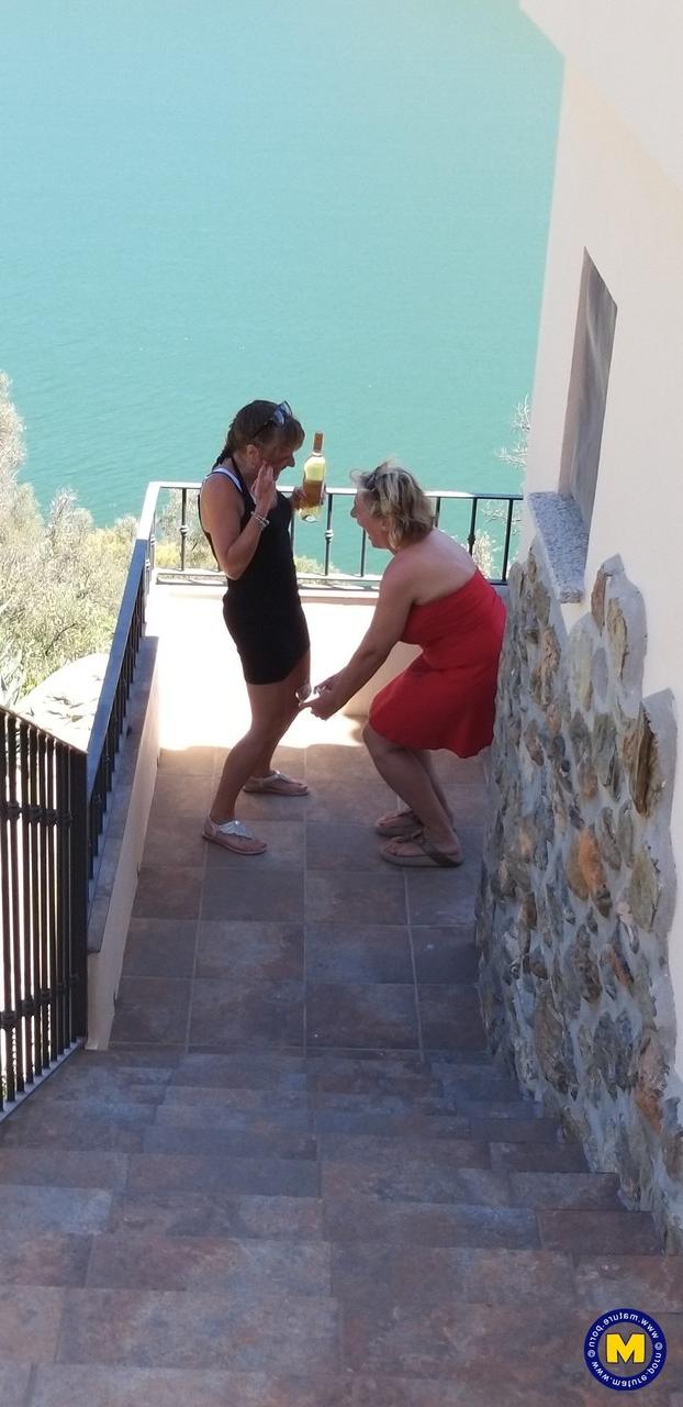 20P Curvaceous mature lesbians Camilla C & Pandora drinking wine on vacation