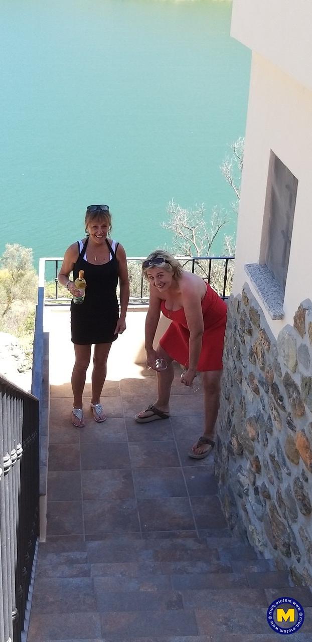 20P Curvaceous mature lesbians Camilla C & Pandora drinking wine on vacation