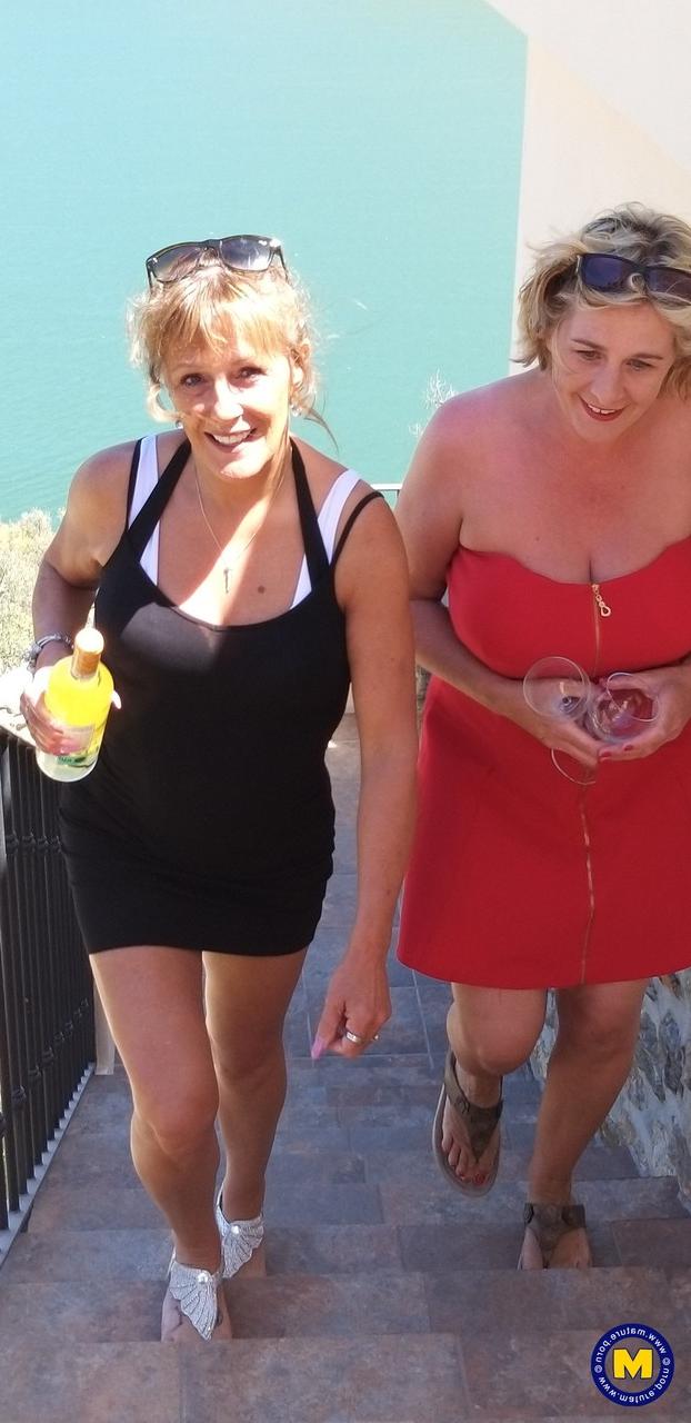 20P Curvaceous mature lesbians Camilla C & Pandora drinking wine on vacation
