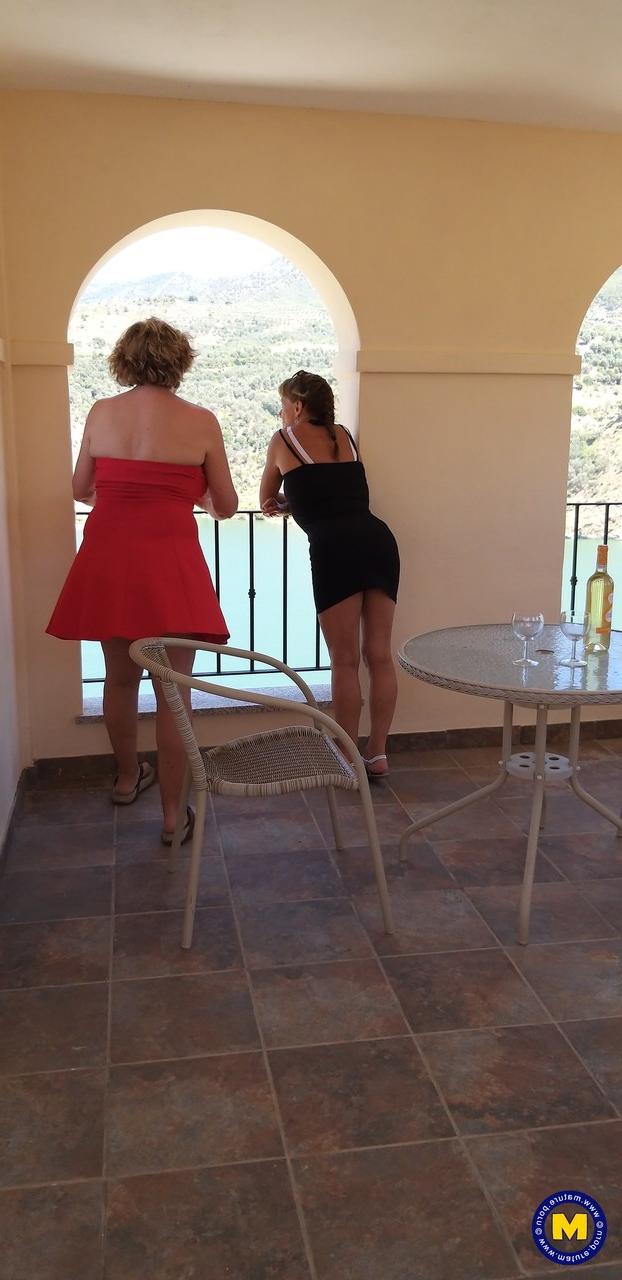 20P Curvaceous mature lesbians Camilla C & Pandora drinking wine on vacation