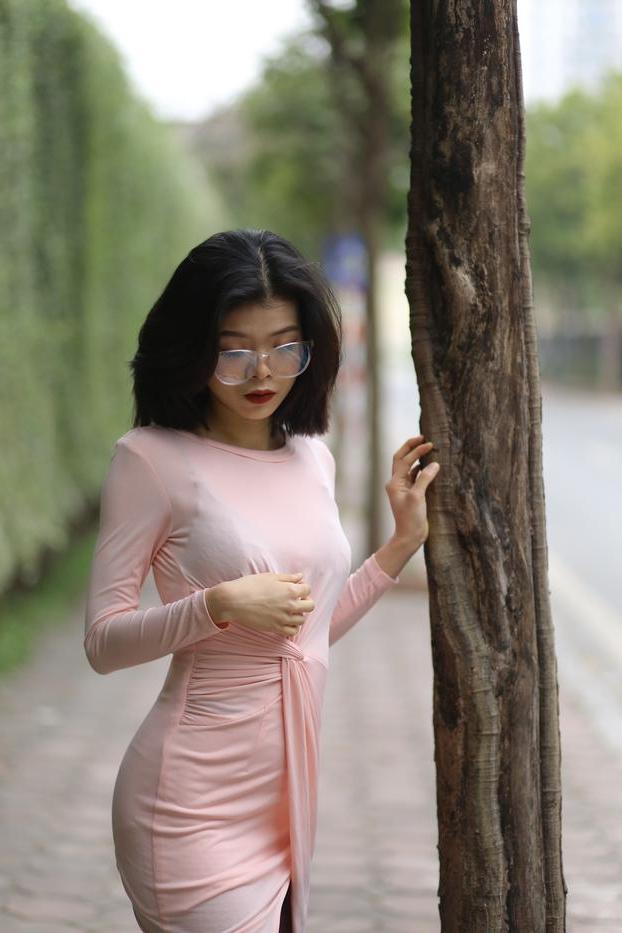 20P Breathtaking Asian model Irena posing in her sexy tight outfit outdoors