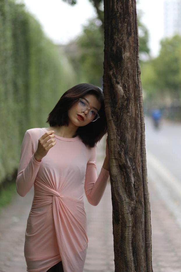 20P Breathtaking Asian model Irena posing in her sexy tight outfit outdoors