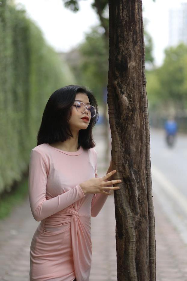 20P Breathtaking Asian model Irena posing in her sexy tight outfit outdoors