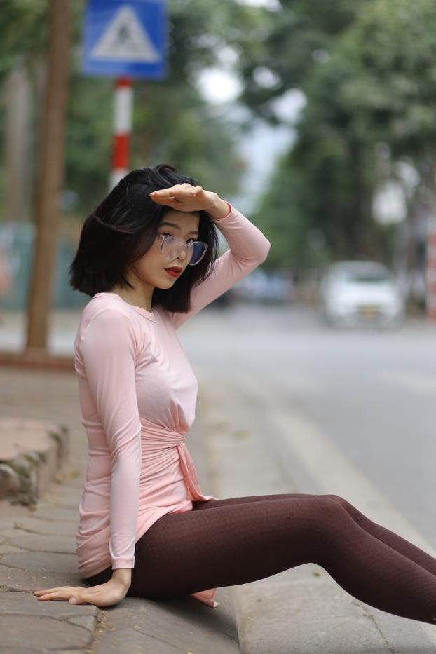 20P Breathtaking Asian model Irena posing in her sexy tight outfit outdoors