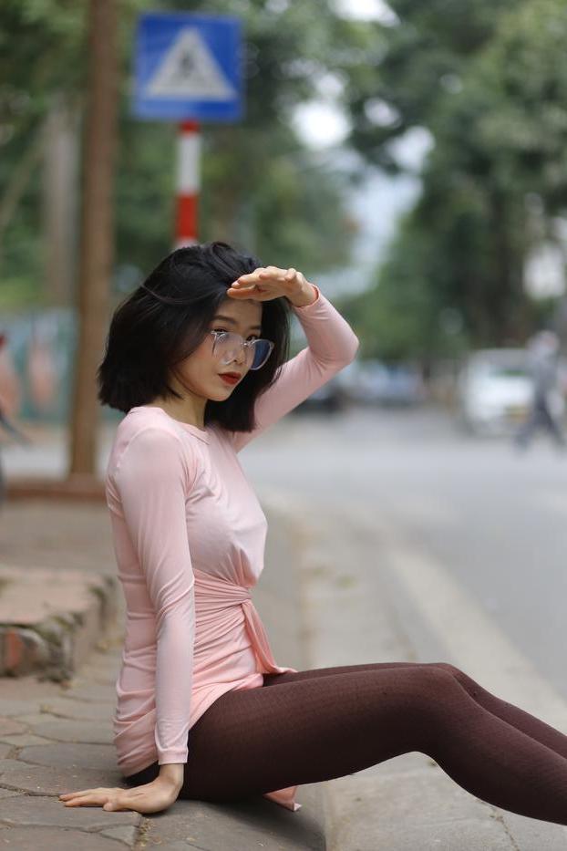 20P Breathtaking Asian model Irena posing in her sexy tight outfit outdoors