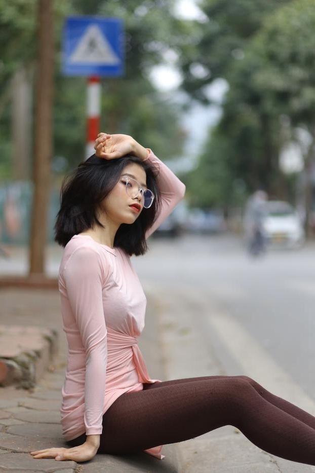 20P Breathtaking Asian model Irena posing in her sexy tight outfit outdoors