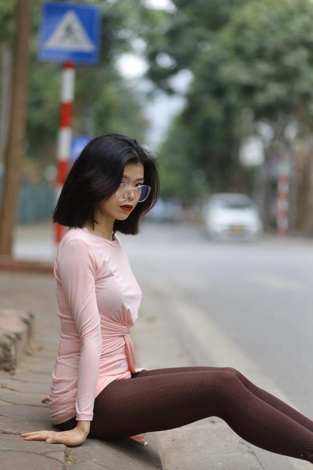 20P Breathtaking Asian model Irena posing in her sexy tight outfit outdoors