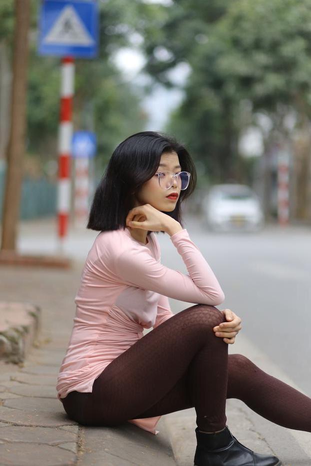 20P Breathtaking Asian model Irena posing in her sexy tight outfit outdoors