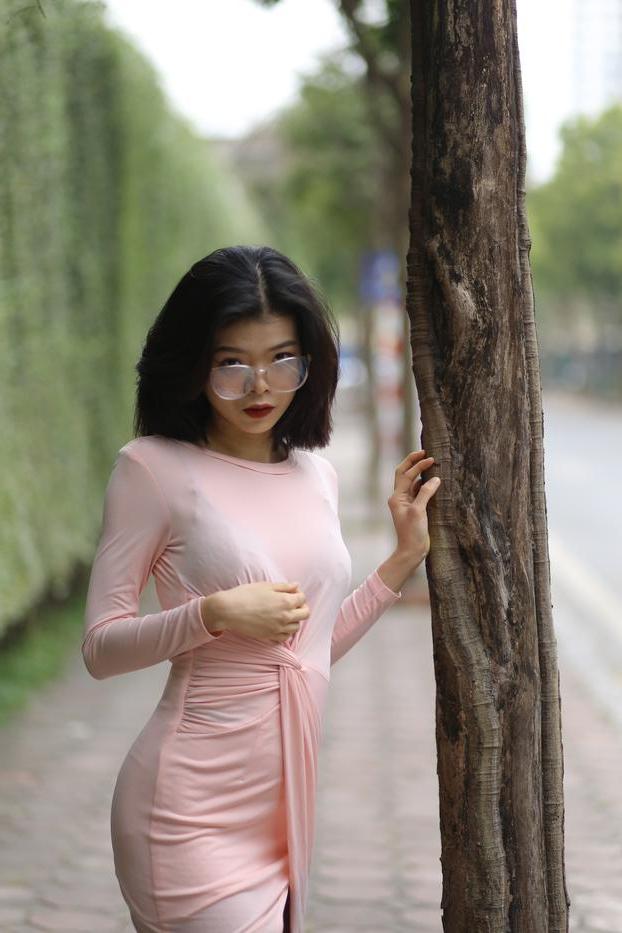 20P Breathtaking Asian model Irena posing in her sexy tight outfit outdoors