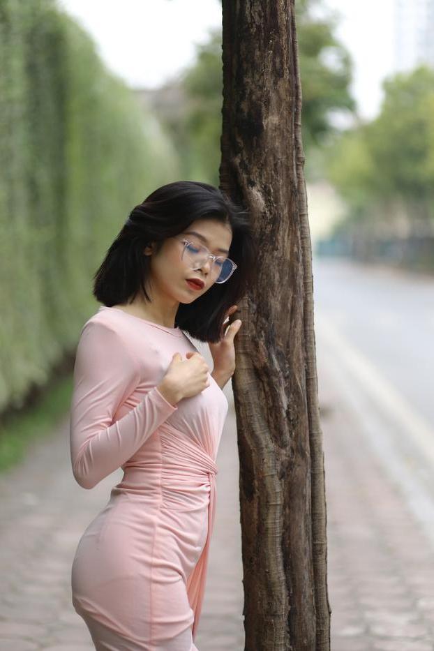 20P Breathtaking Asian model Irena posing in her sexy tight outfit outdoors