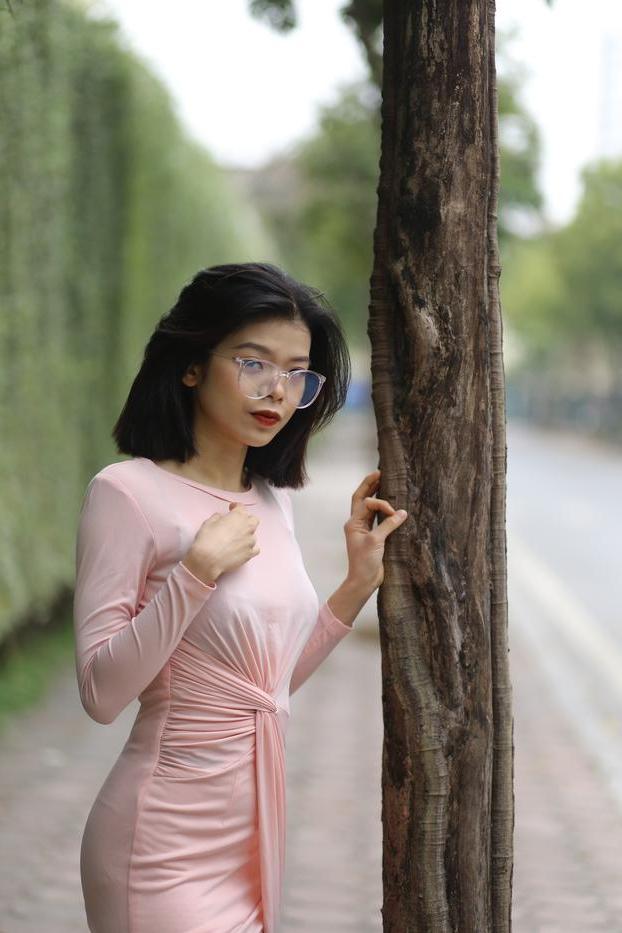 20P Breathtaking Asian model Irena posing in her sexy tight outfit outdoors