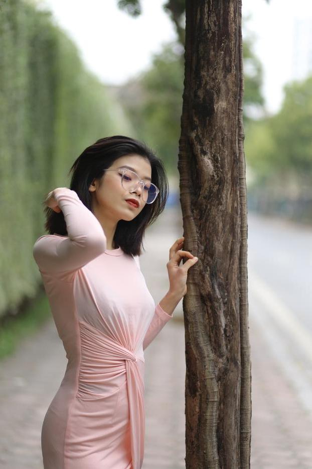 20P Breathtaking Asian model Irena posing in her sexy tight outfit outdoors